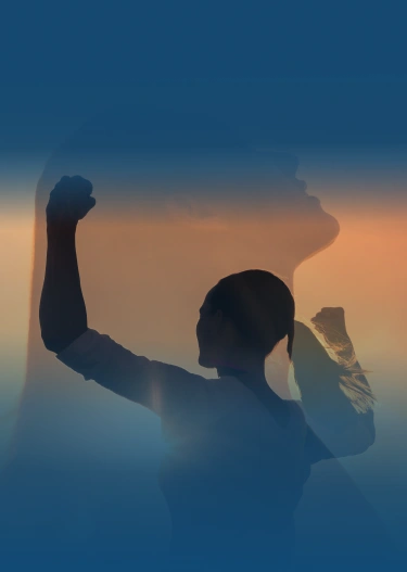 The silhouette of a strong woman with clenched fists.