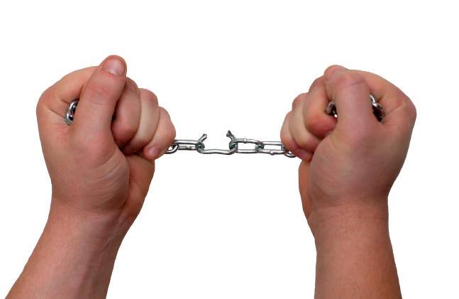 Hands breaking a chain.