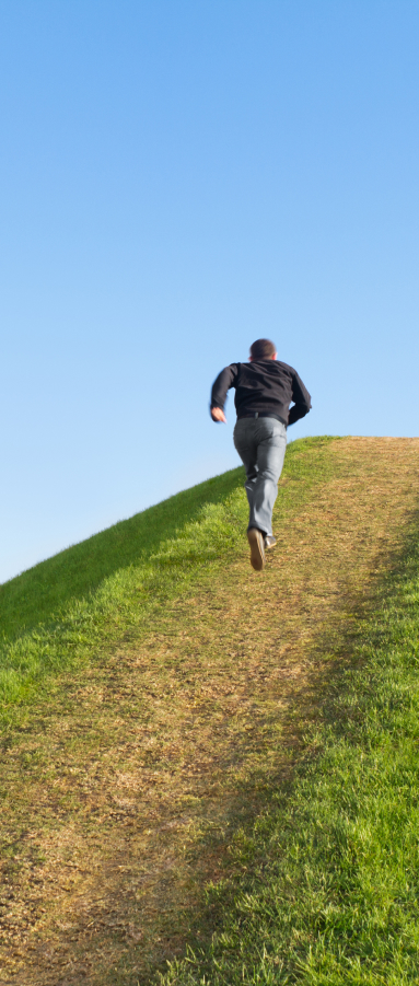 A man running uphill.